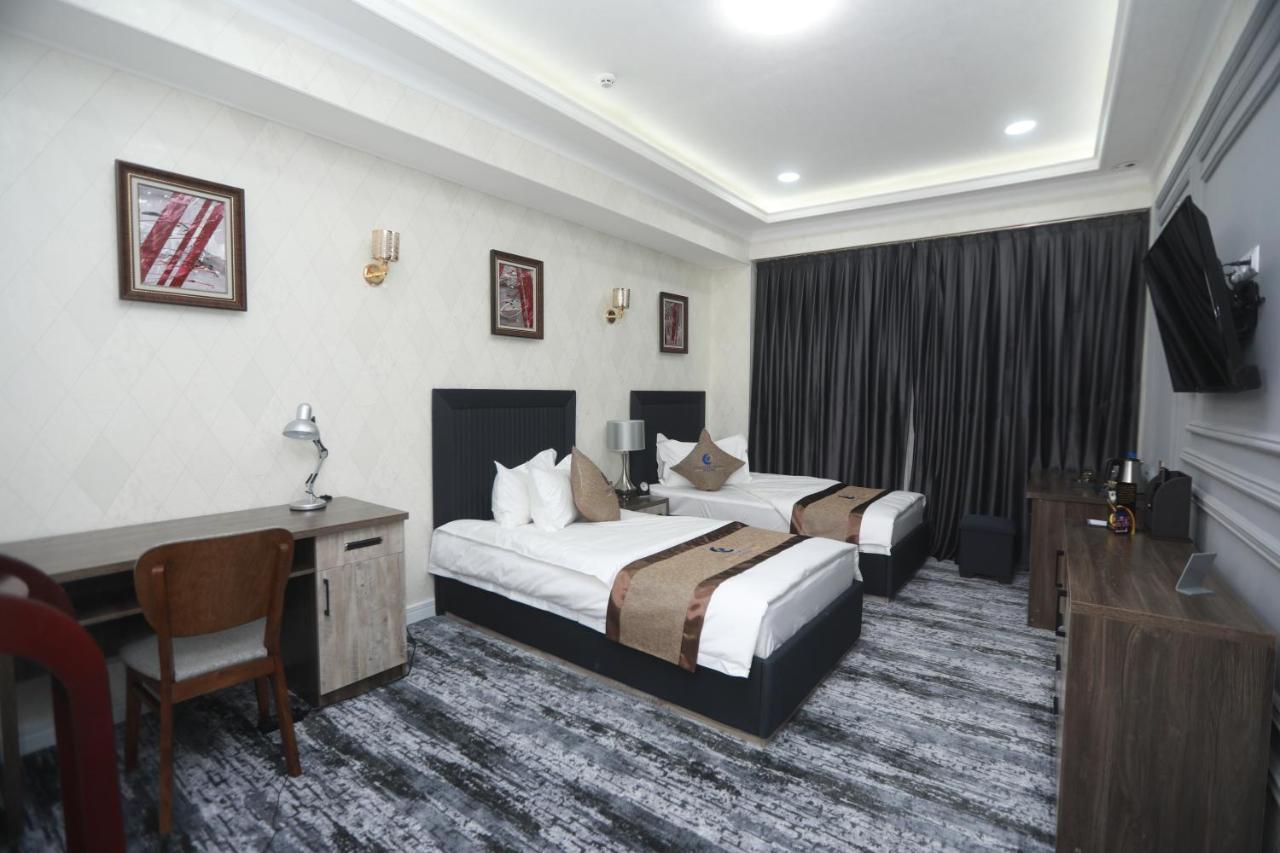 Tinchlik Plaza Hotel นาวอย ภายนอก รูปภาพ