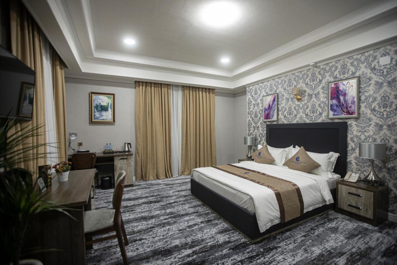 Tinchlik Plaza Hotel นาวอย ภายนอก รูปภาพ